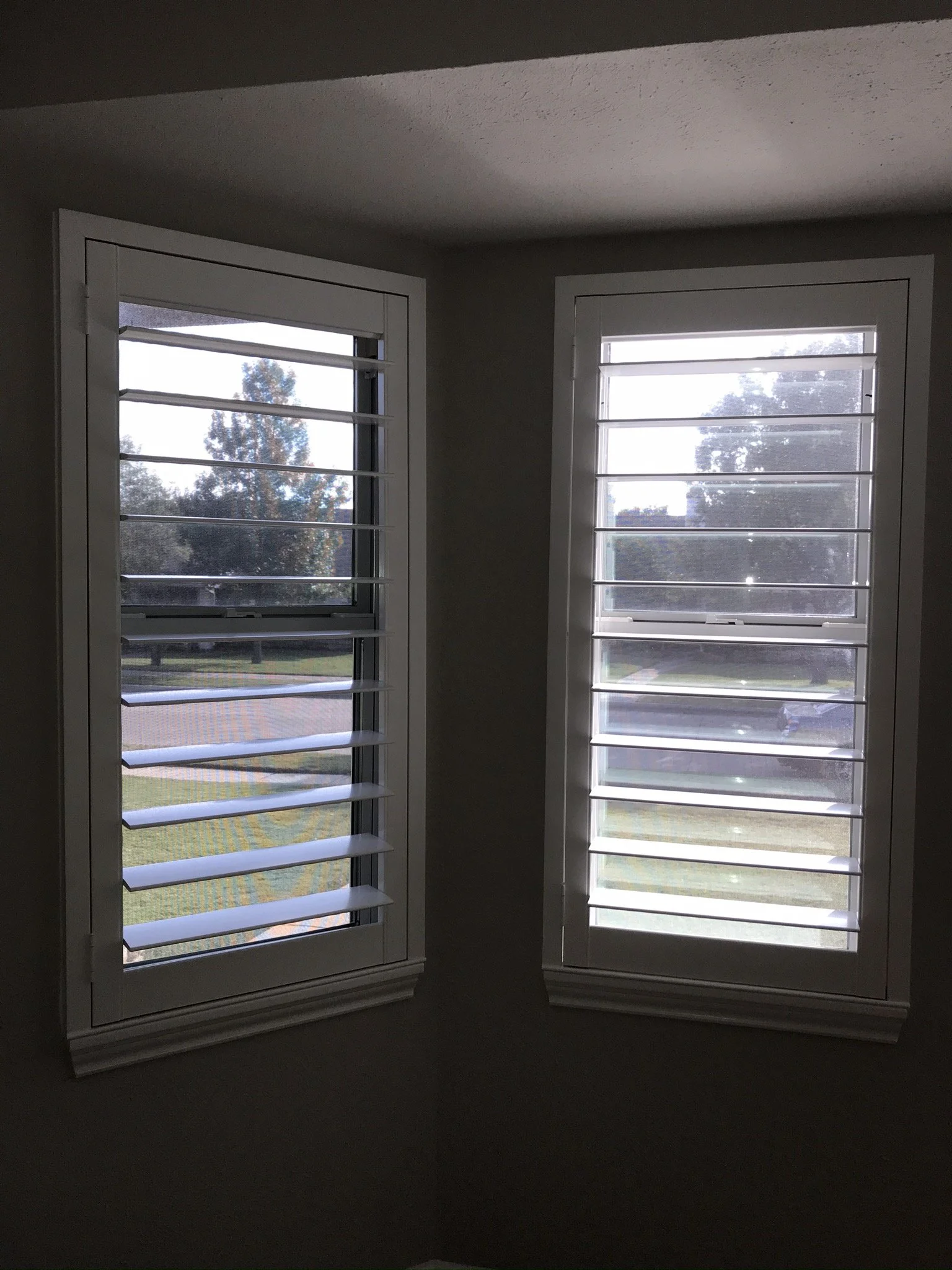 Custom wood plantation shutters with clearview (rear hidden tilt), 4 1/2" louvers, painted SW Pure White semi-gloss, 1.5" flat master frame and Z frame, no splits.  1 panel.