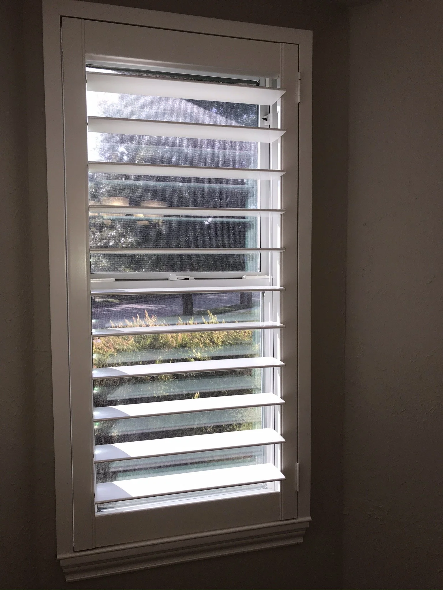 Custom wood plantation shutters with clearview (rear hidden tilt), 4 1/2" louvers, painted SW Pure White semi-gloss, 1.5" flat master frame and Z frame, no splits.  1 panel.