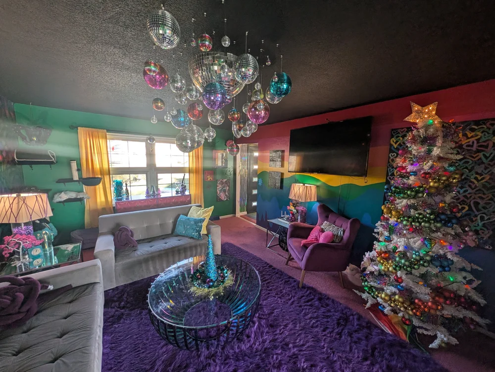Disco Rainbow Lounge with a cloud of disco balls and purple shag rug