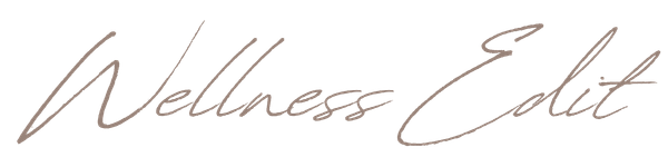 A stylized text logo that says 'Wellness Edits' in cursive font.