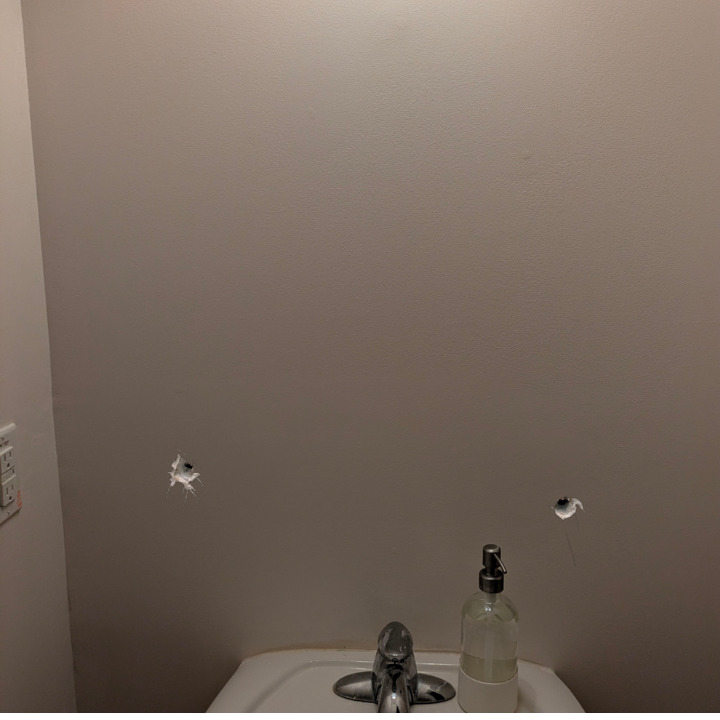 Drywall anchor holes before repair