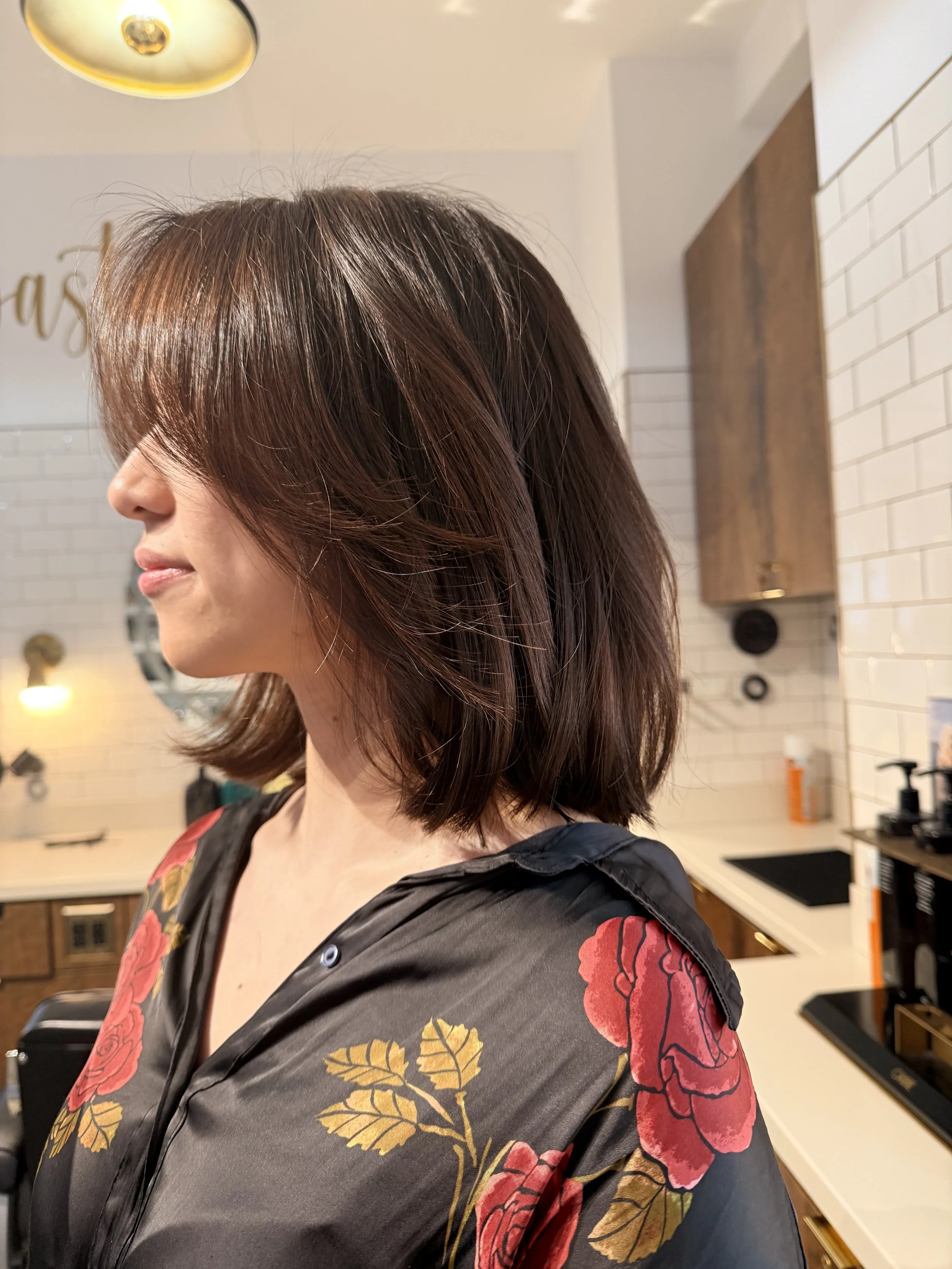 Single process hair color creating rich, even brown tone with natural shine