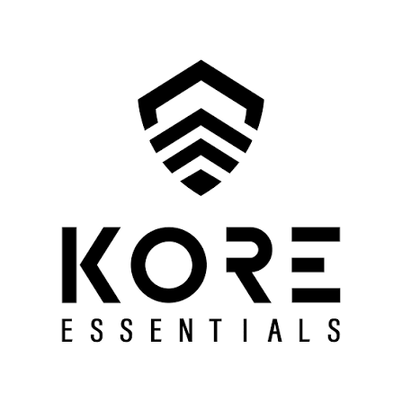 Logo for KORE Essentials featuring a stylized shield emblem above the text 'KORE' with 'ESSENTIALS' written underneath.