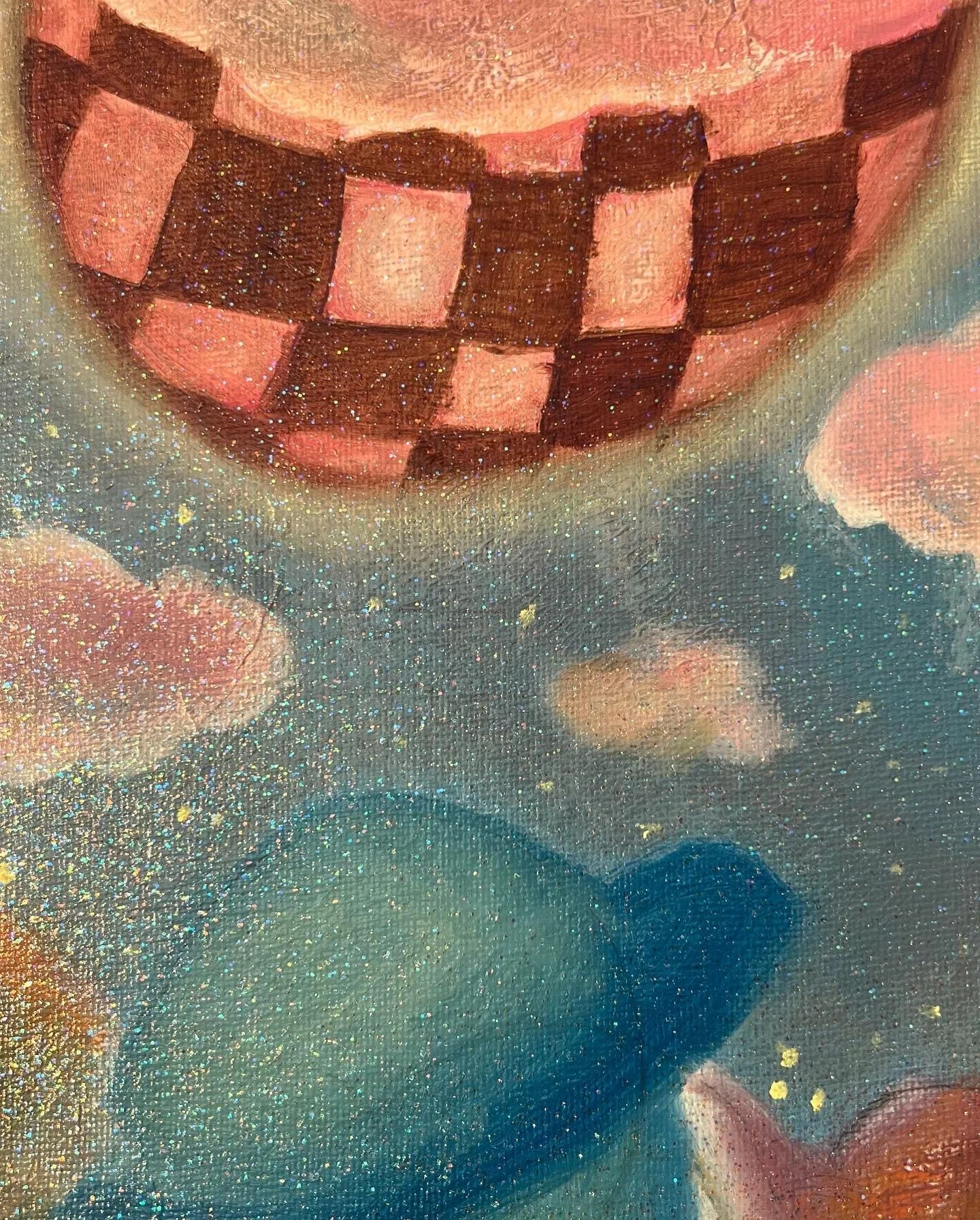 Close-up of a painting showing a smiling mouth with red and black checkered teeth, surrounded by pink clouds and a sparkly background.