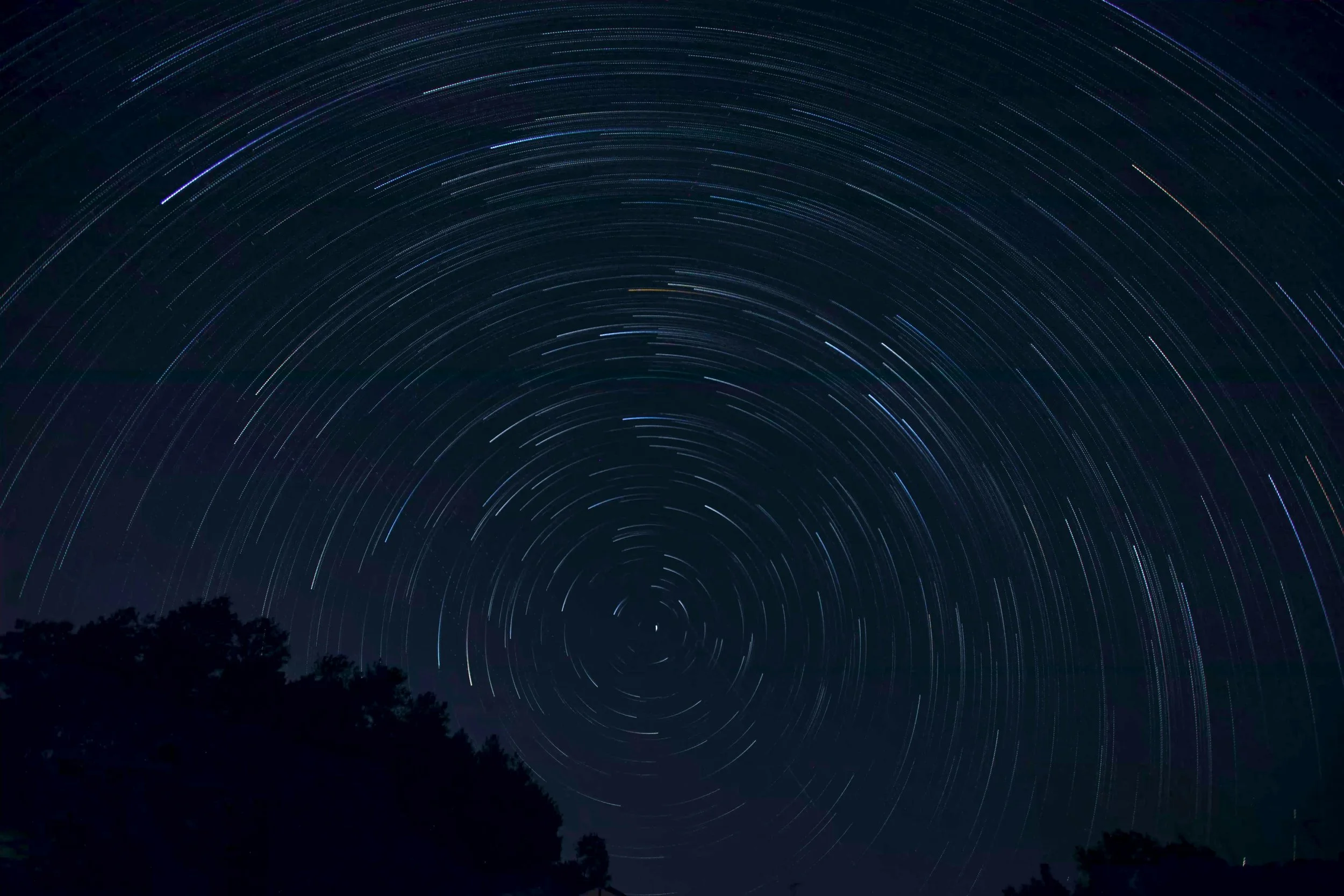 Blurred stars circle a polestar