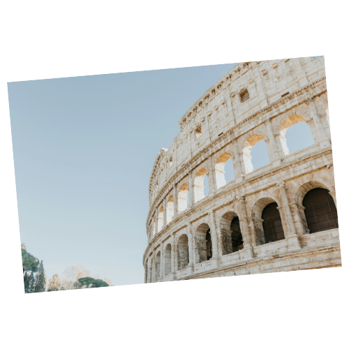 Ancient Roman Colosseum against a clear blue sky.