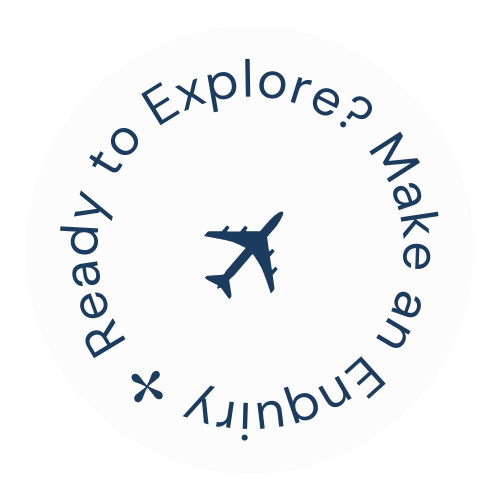 Circular badge with airplane icon in the center and the text 'Ready to Explore? Make an Empty' around it.