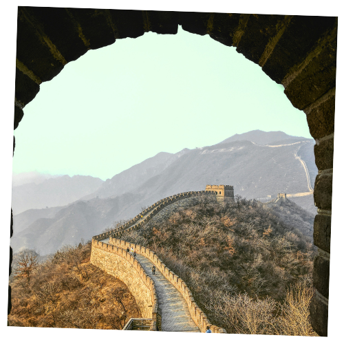 View of the Great Wall of China seen through an archway.