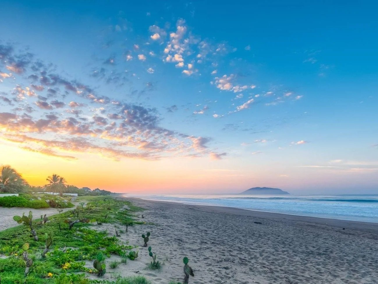Marea Beachfront Villas beach at sunrise