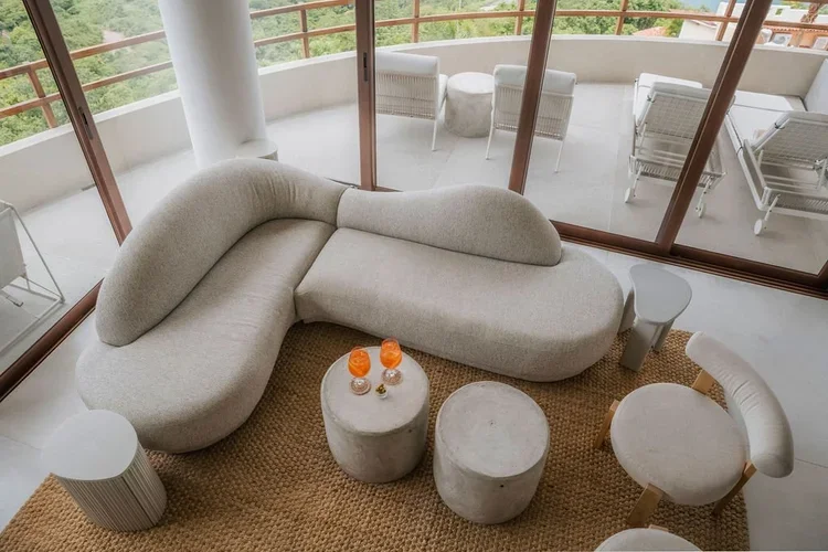 Contemporary residences integrated into the natural hillside of Cerro del Vigía.