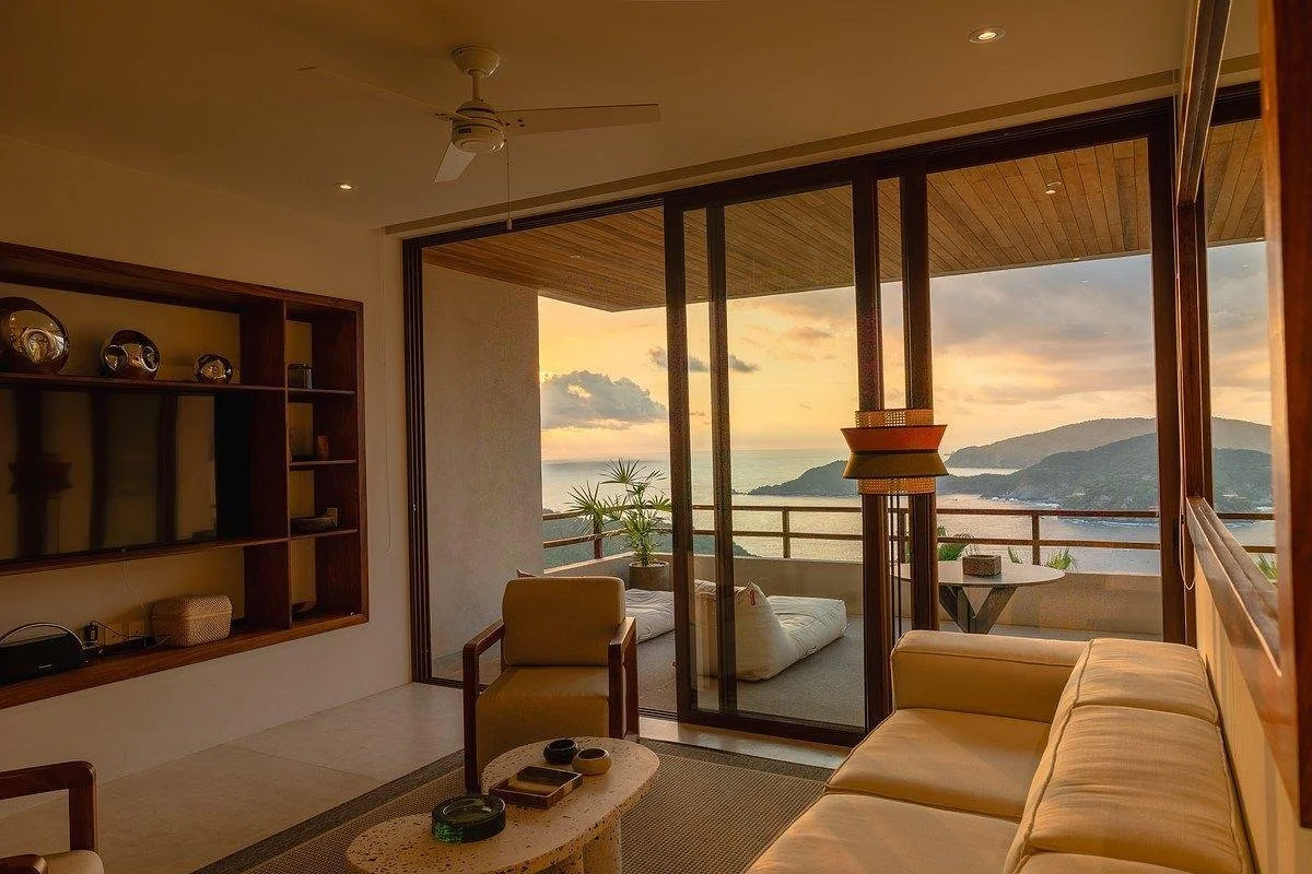 Furnished living area and terrace of a coastal residence in Zihuatanejo, Mexico.