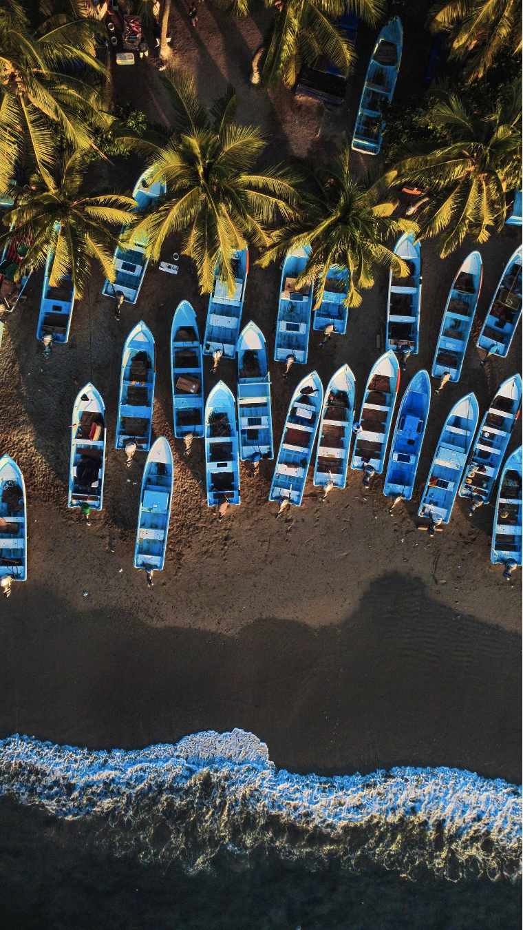 Aerial view of Zihuatanejo Bay, beaches, and surrounding coastal landscape.