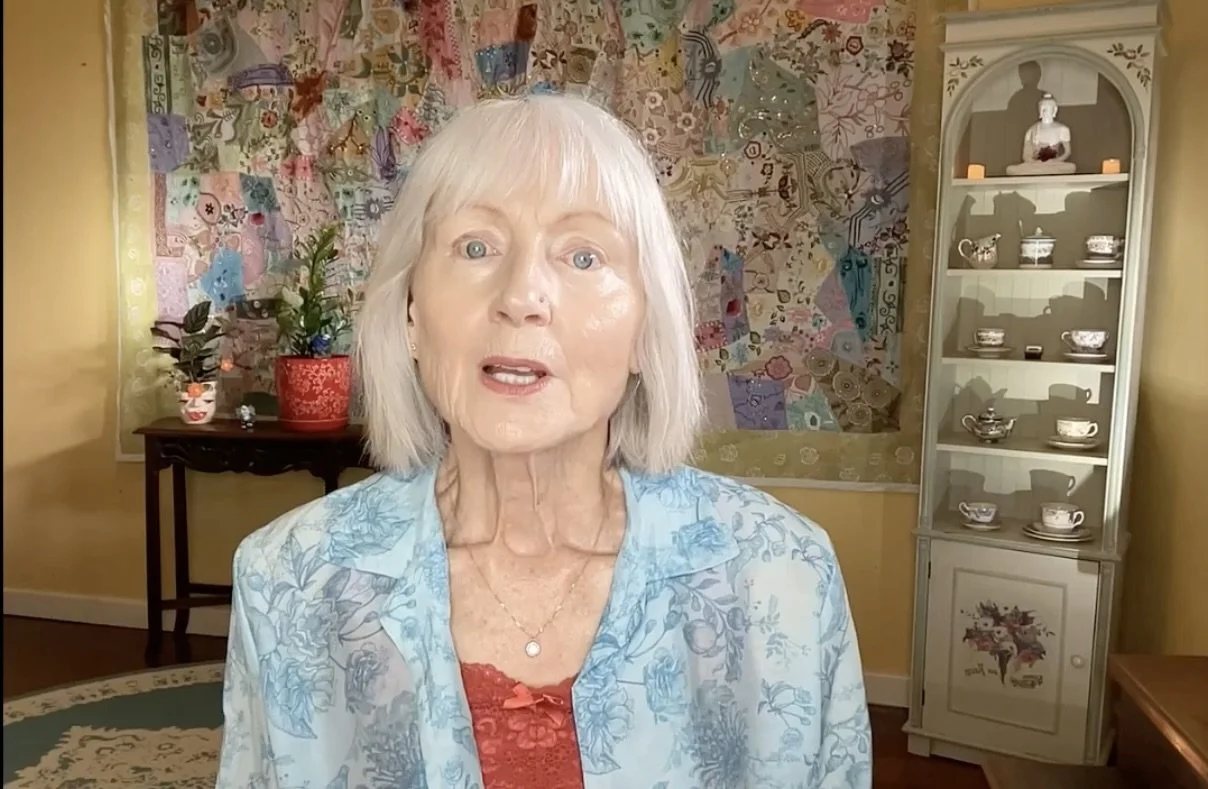 Older woman with surprised expression