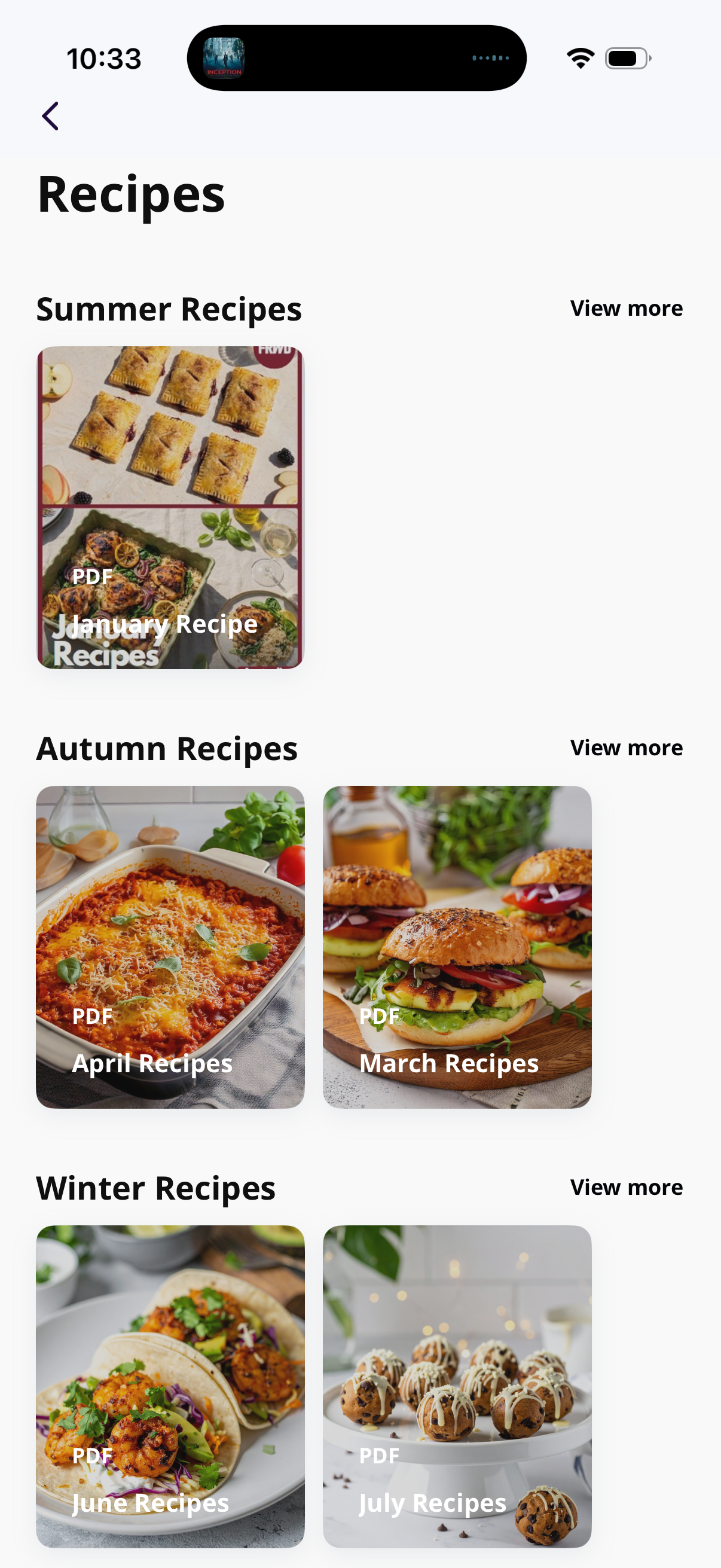 Screenshot of a mobile app displaying various winter recipes, including tacos and cookies, categorized by seasons with PDF icons and recipe titles.