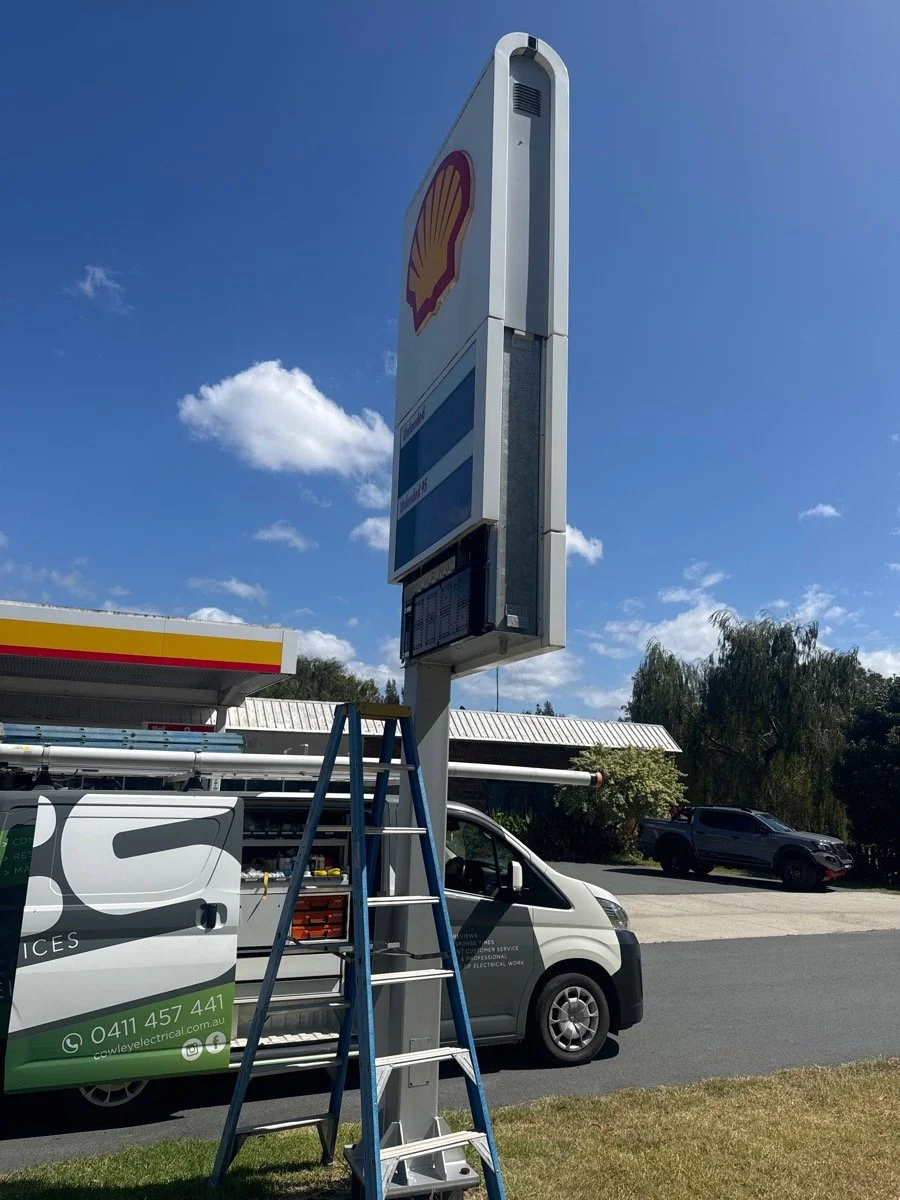 CES van at Shell Service Station fixing the signage lighting