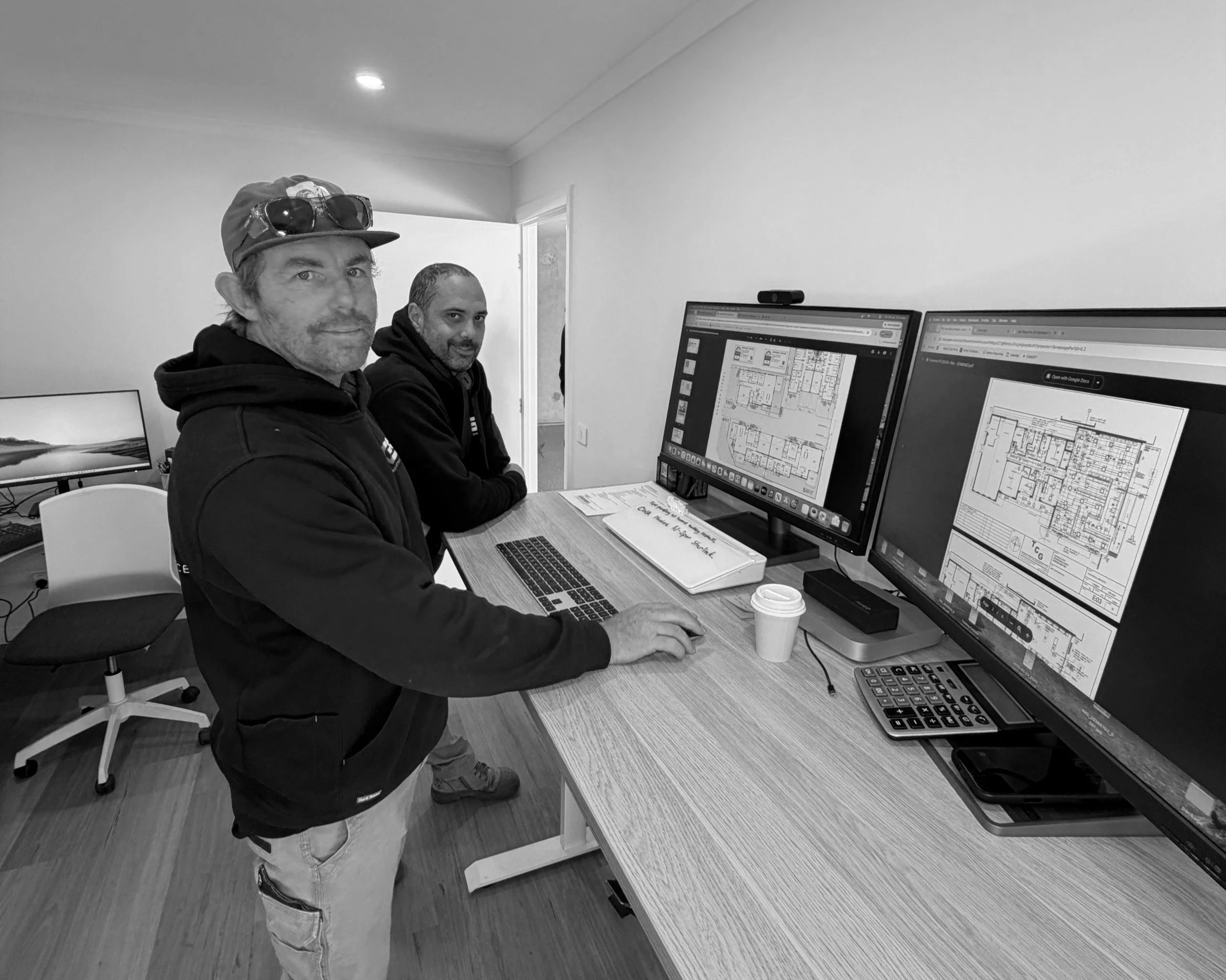 Cowley Electrical Senior Electrician and Managing Director reviewing electrical design plans