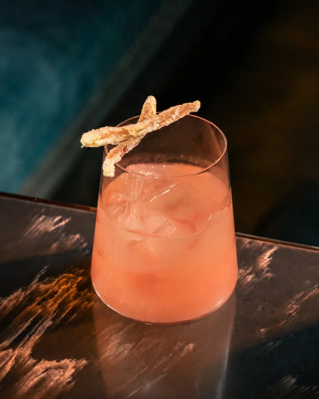 Meet Dreamsicle, a golden blend of Monkey Shoulder Blended Whisky and Smokey Monkey Whisky, brightened with blood orange ginger shrub and finished with honey soda.

Smoky, citrusy and softly sweet, best enjoyed for moments above the city as the last 