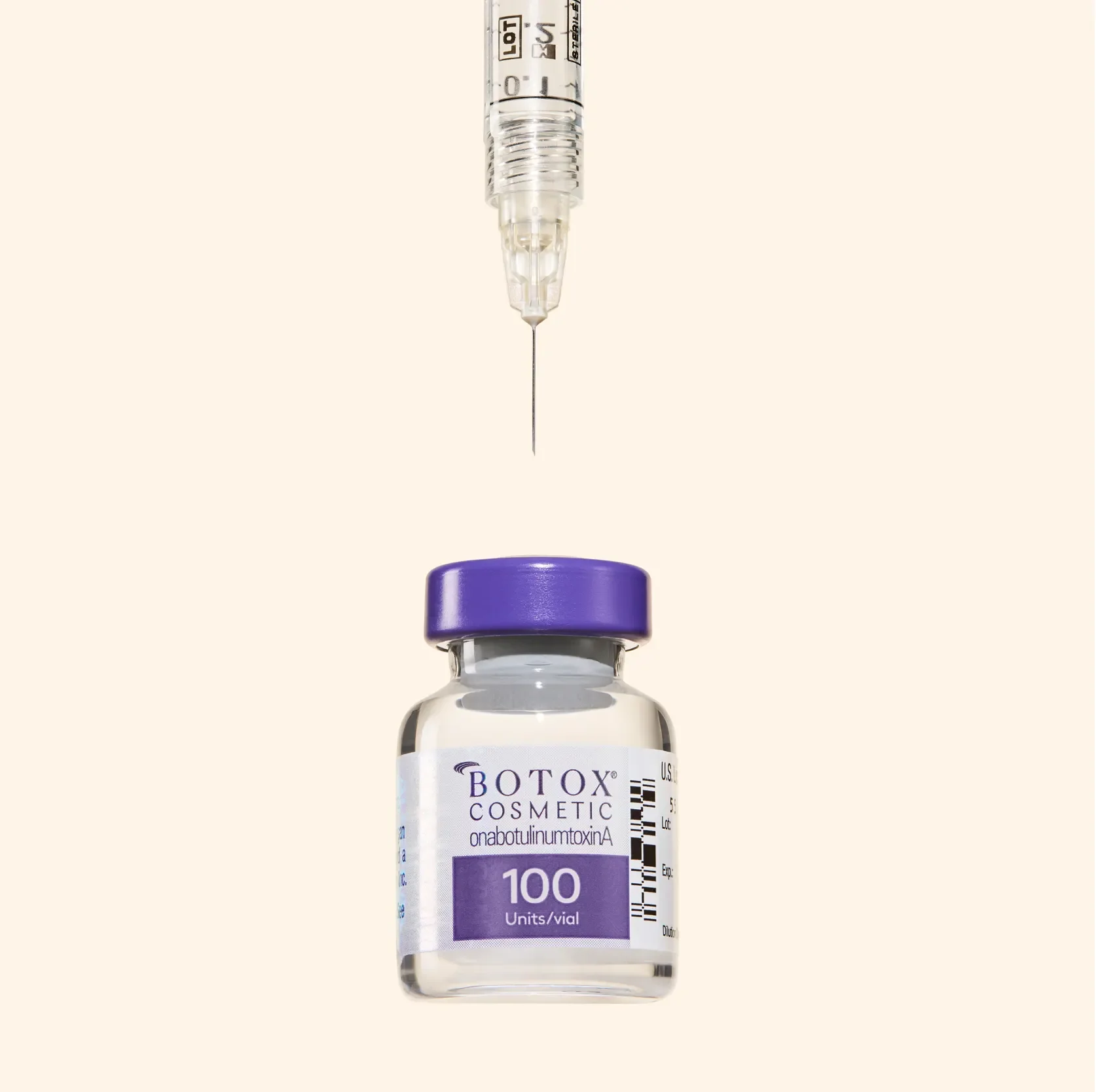 A vial of Botox cosmetic with a purple cap and a label indicating 100 units, and a syringe above it with a needle, ready to inject.