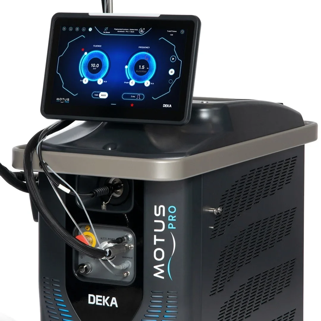 Medical device with a digital touchscreen display showing settings for fluence and frequency, labeled MOTUS PRO by DEKA, used for laser skin treatment.