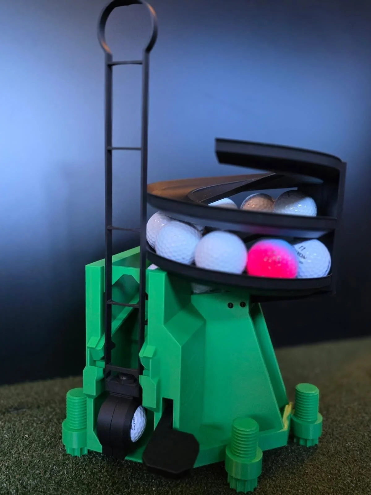 Golf ball dispenser w/ adjustable legs. holds 24 balls