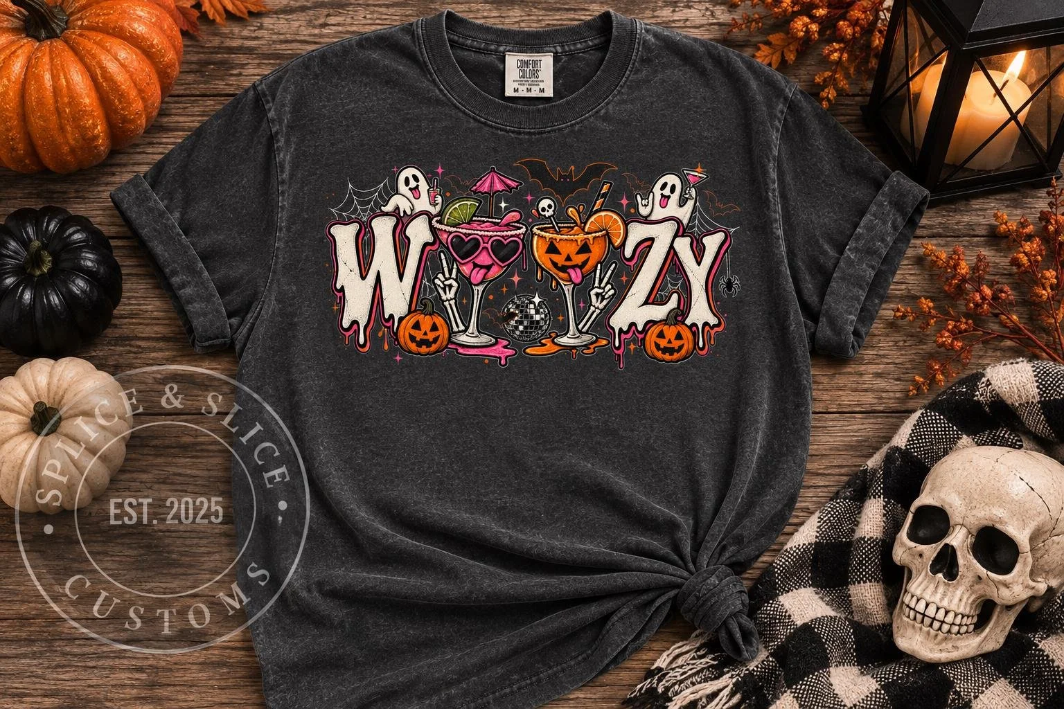 A charcoal gray T-shirt with a Halloween graphic featuring the word WOOZY decorated with ghosts, cocktails, and pumpkins.