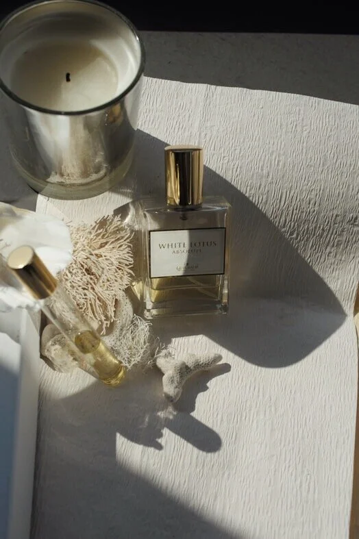 White Lotus Absolute *GOLD Eau de Parfum (right) &amp; Roll on (left)