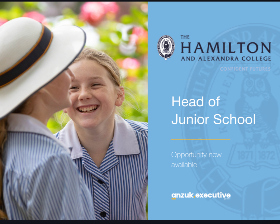 Two young girls in school uniforms smiling and talking outside, next to a blue advertisement for Hamilton and Alexandra College promoting a Head of Junior School position.