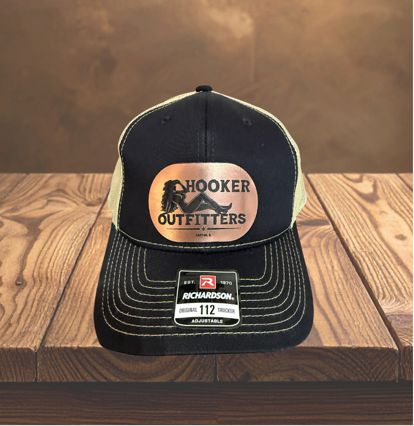 Black and Tan copper patch hat front.png