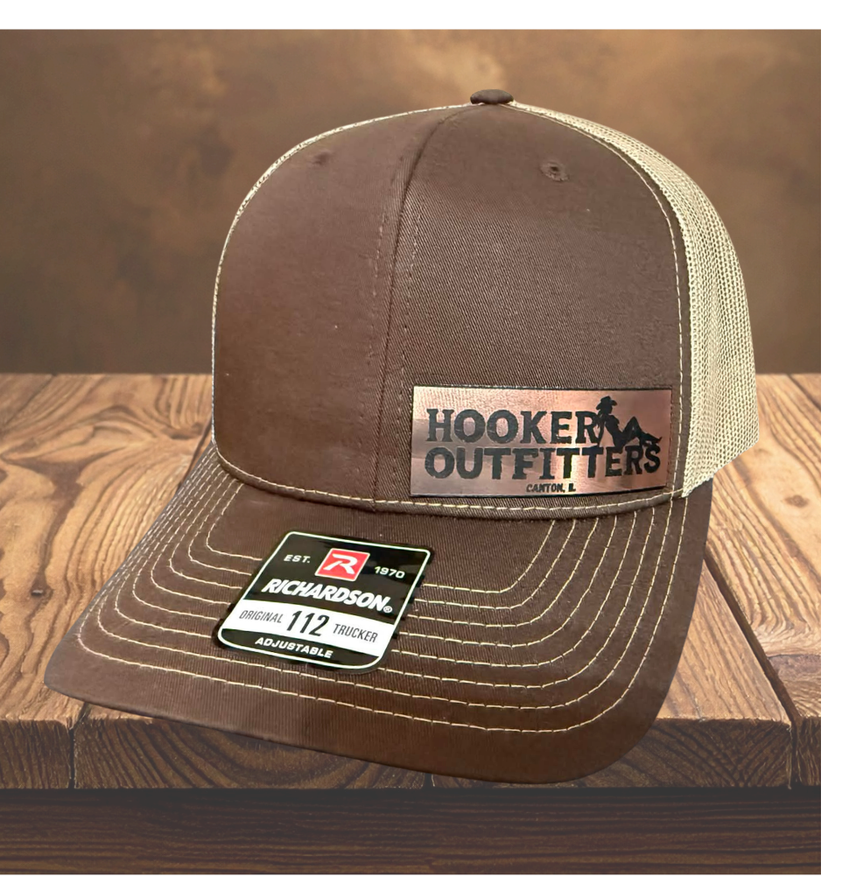 Brown with small copper patch front.png