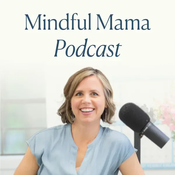 A woman smiling in front of a microphone with a background that reads 'Mindful Mama Podcast'.