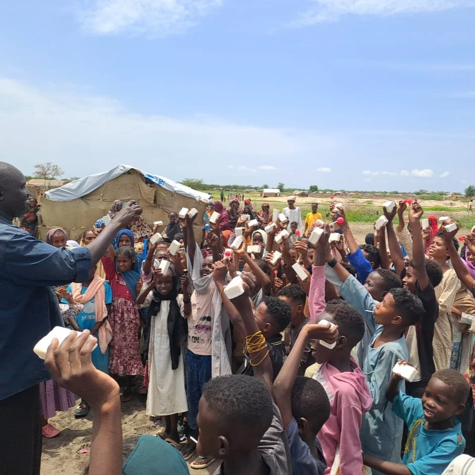 #educationanddramaforpeace#WASH Children at Chemedi #refugeecamp and the soap made during EDP's Soap Production Training for #Sudanese#refugees #peaceinSudan