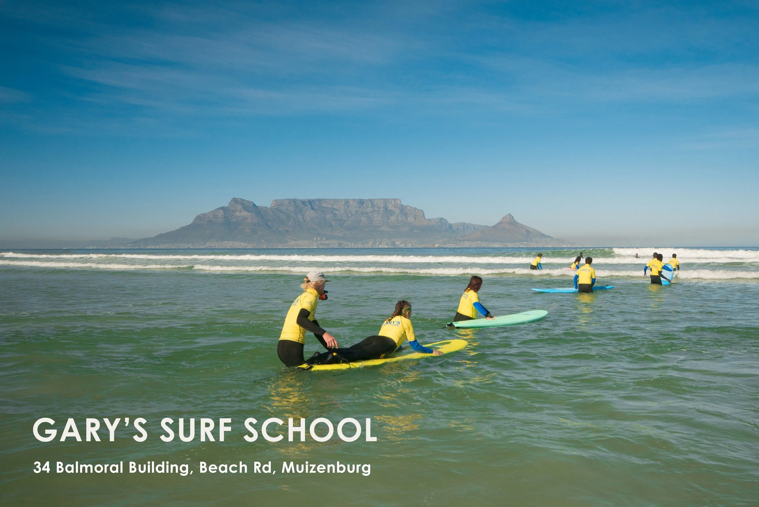 Nestled on the world-famous shores of Muizenberg Beach, Gary's Surf School offers the perfect introduction to surfing in Cape Town. Whether you're a first-time surfer or looking to improve your skills, their experienced instructors provide personaliz