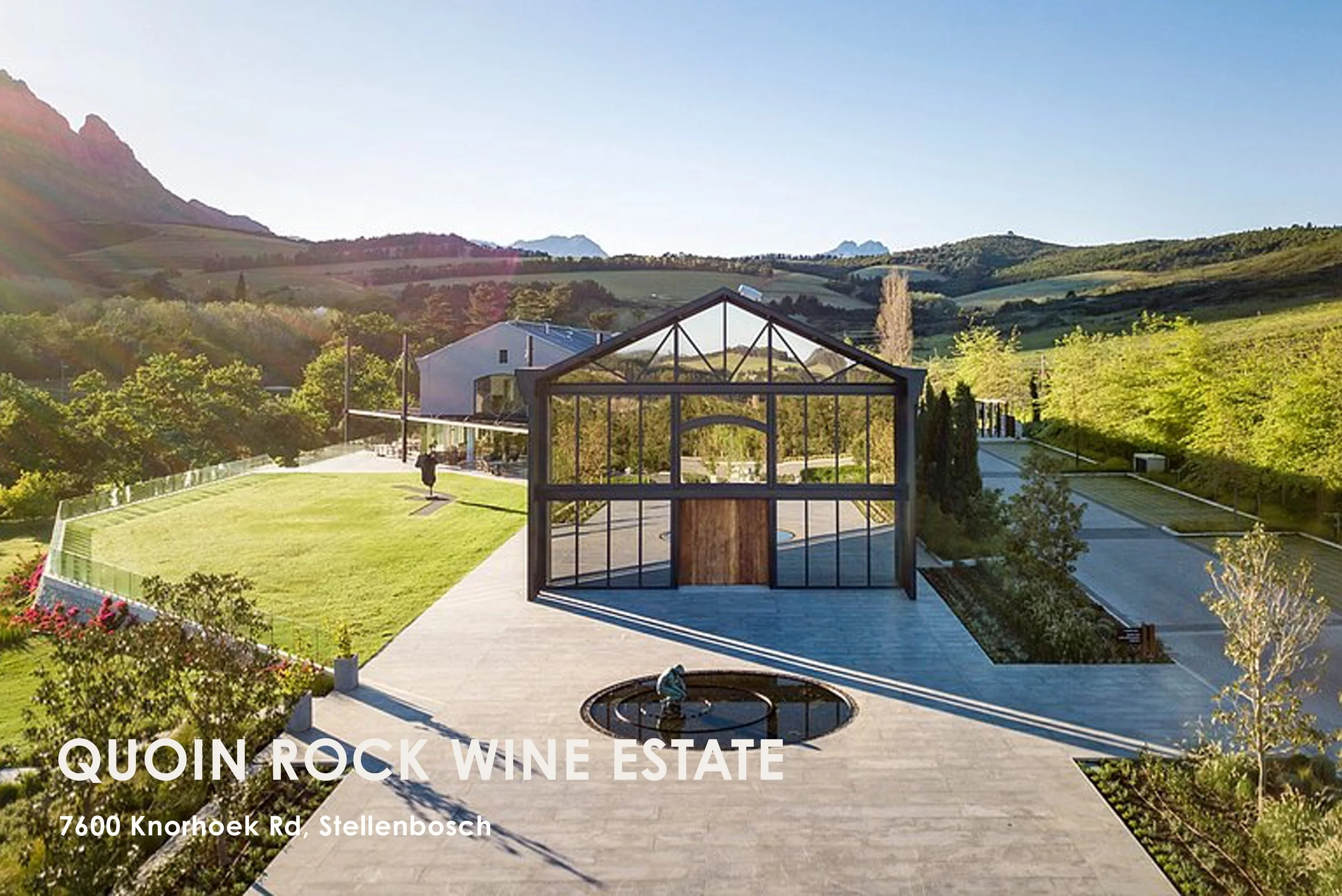 Quoin Rock Wine Estate sits in the scenic Knorhoek Valley beneath the Simonsberg Mountains in Stellenbosch, blending contemporary architecture with classic estate charm. Known for its award-winning wines, refined tastings, and the acclaimed Gåte rest
