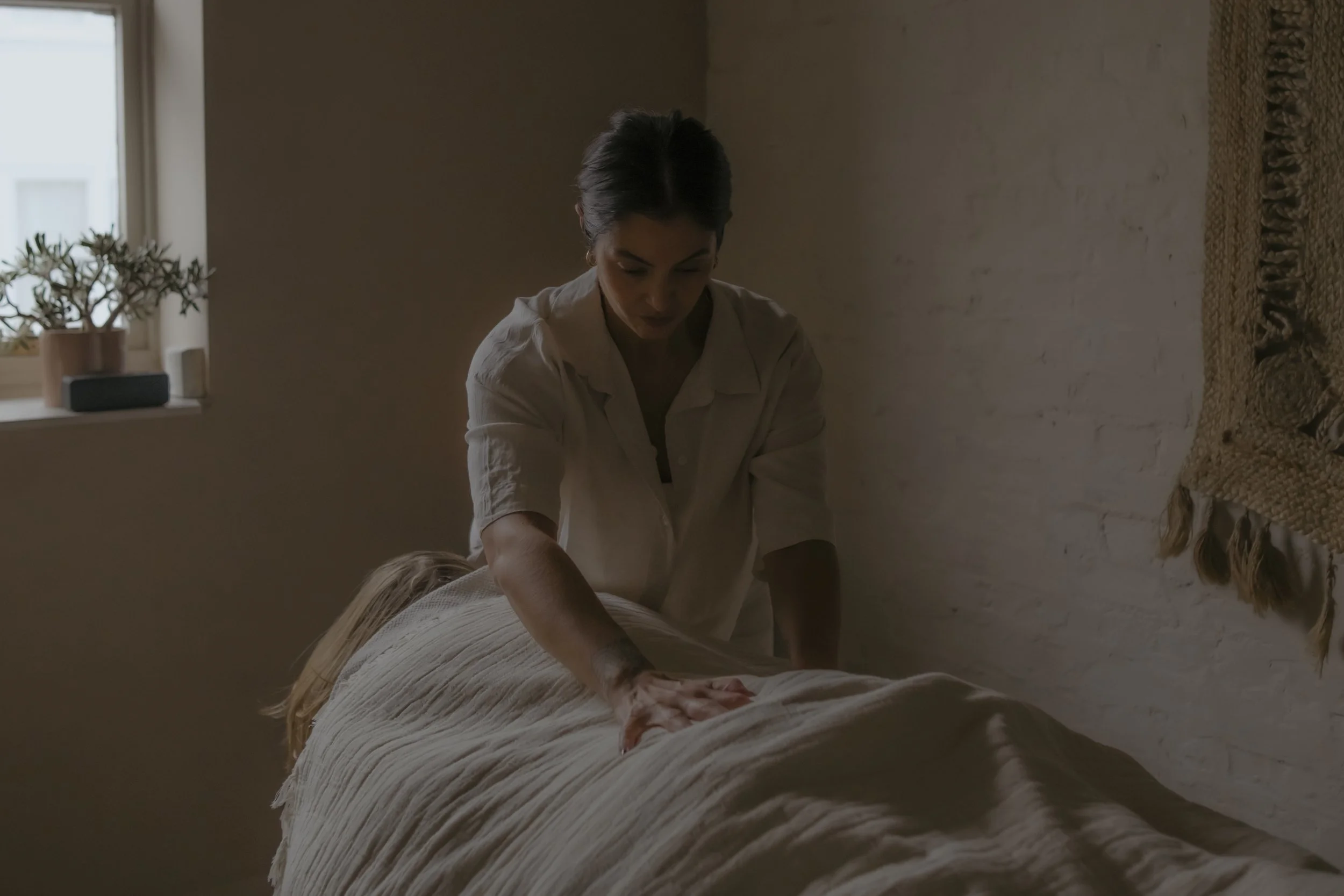 Woman's massage by woman in Brighton, women's embodied holistic health