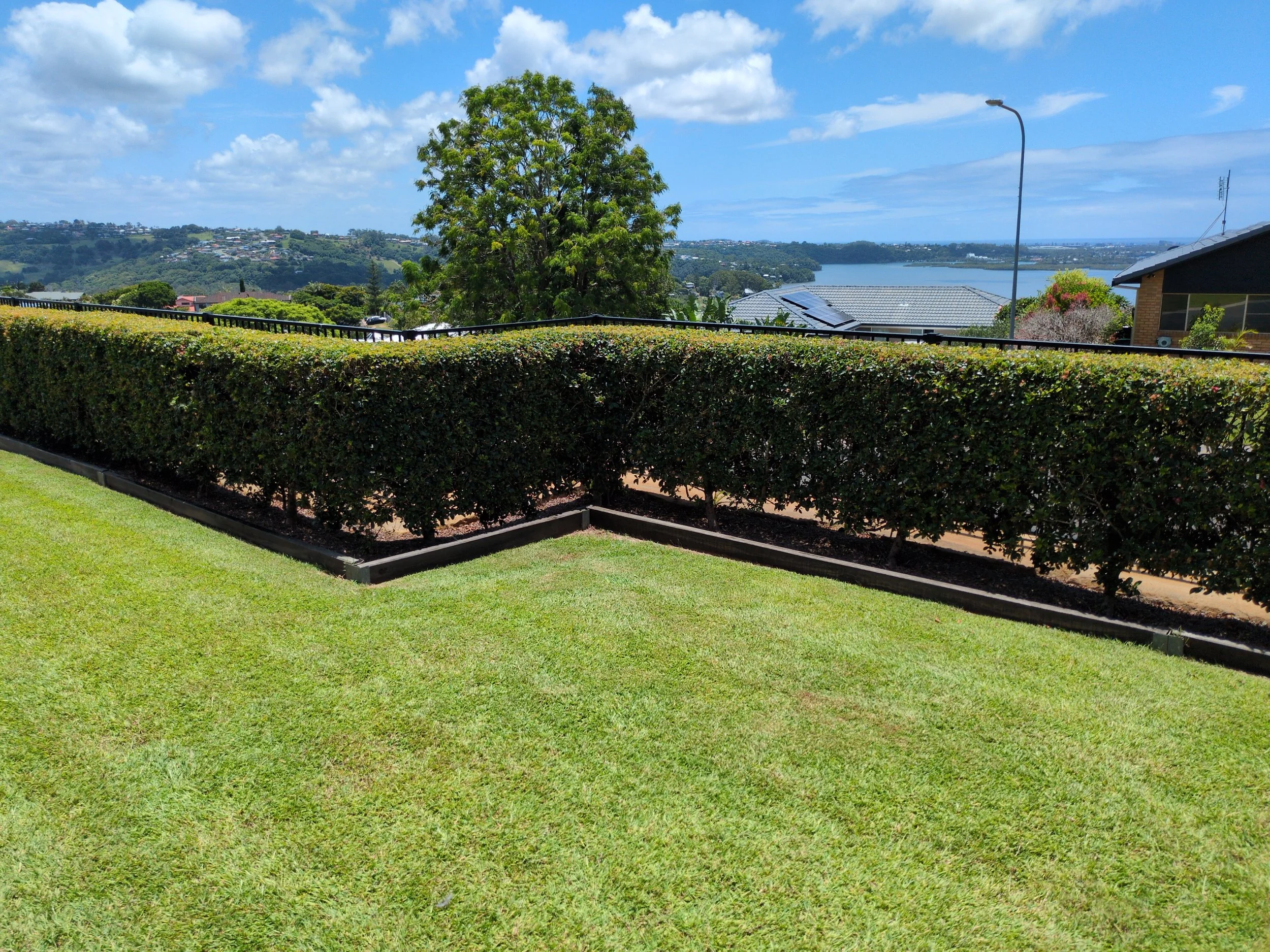 Lawn maintenance and hedge trimming by Coastal Grounds in Pottsville NSW
