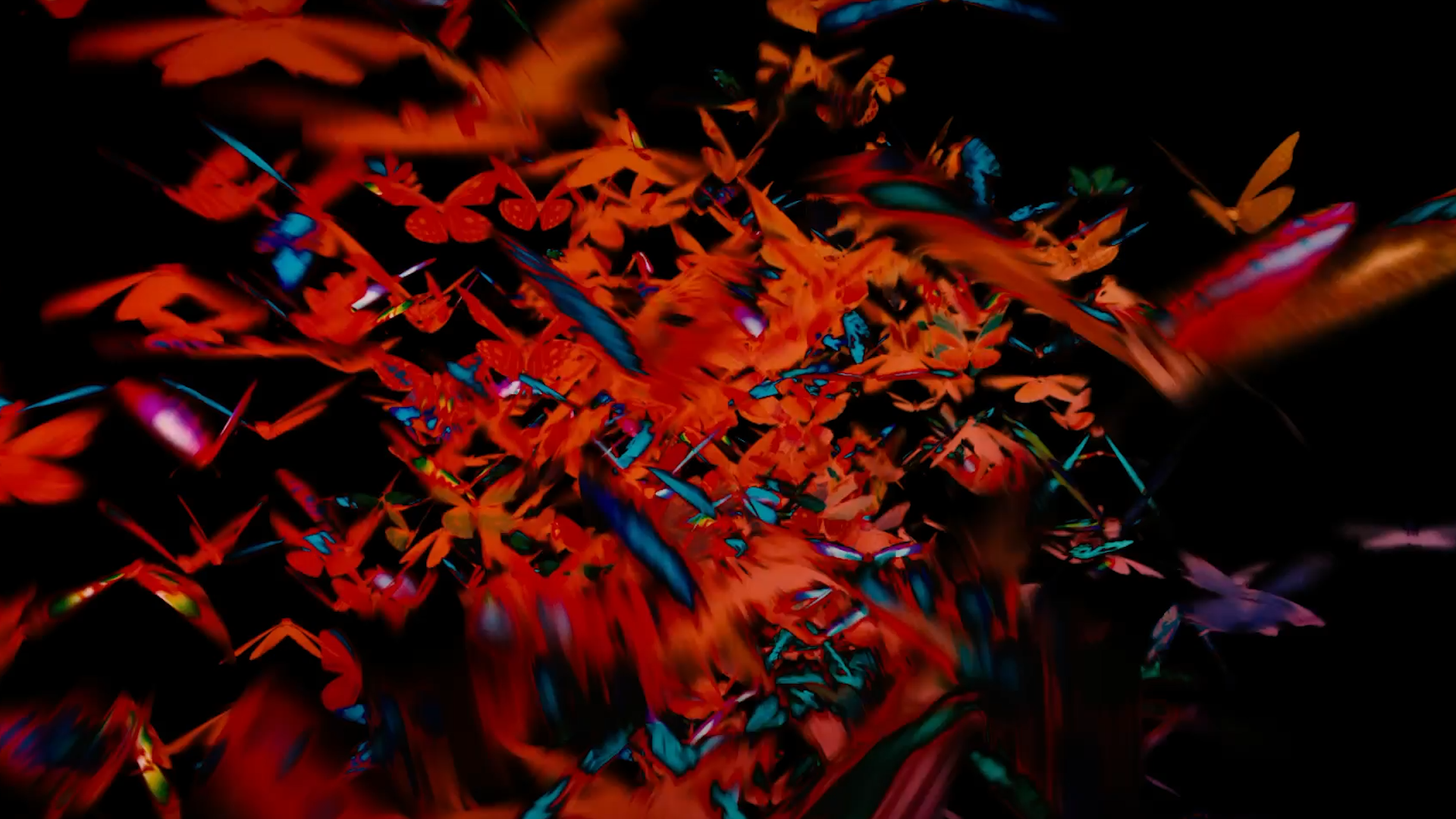 Abstract digital artwork with vibrant red, orange, blue, green, and purple colors and swirling patterns.