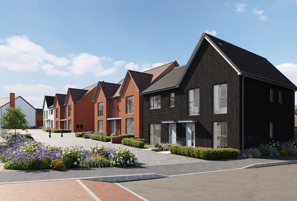 Row of modern houses with colorful facades, neatly landscaped gardens and sky with clouds.