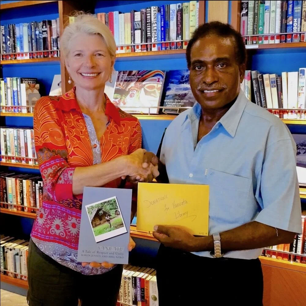 May I introduce Abel to you, our tour guide on several trips to the beautiful islands of Vanuatu. He soon became a friend who shared with us how he grew up on a remote island in the South Pacific. Our collaboration resulted in a book that he consequently introduced to many schools in Vanuatu to help preserve the island’s cultural heritage. I’m proud to say that sales on cruise ships and in local book storew netted enough funds to build two 1000 liter freshwater tanks for local primary schools.