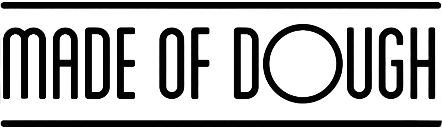Text that reads 'Made of Dough' in black outline on transparent background.