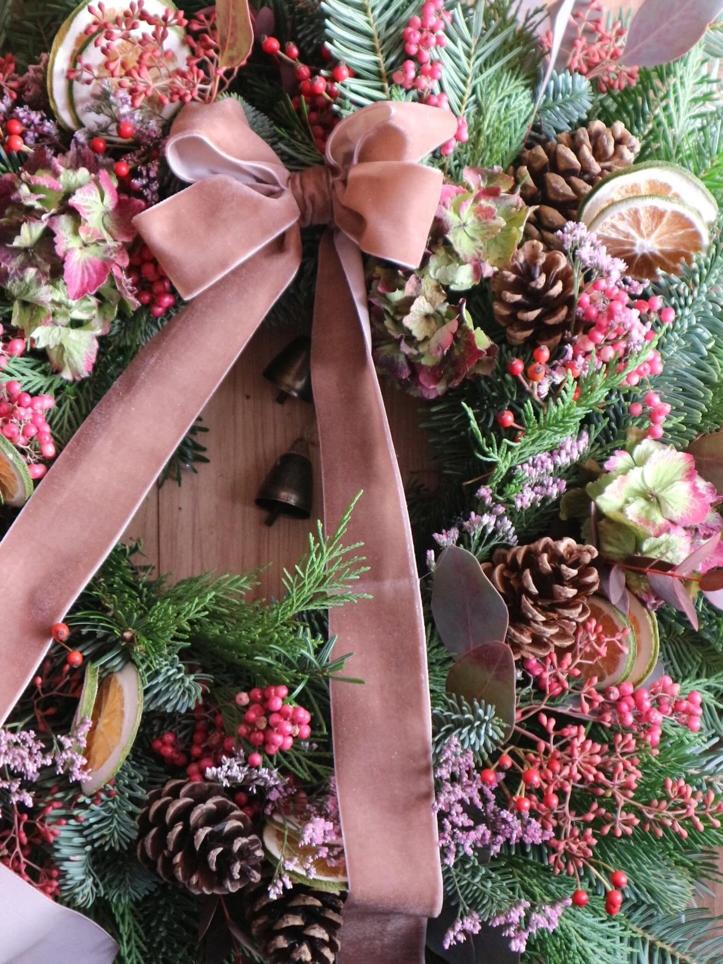 Can you spot the little 🔔? I can't resist a wreath with a soft pink bow