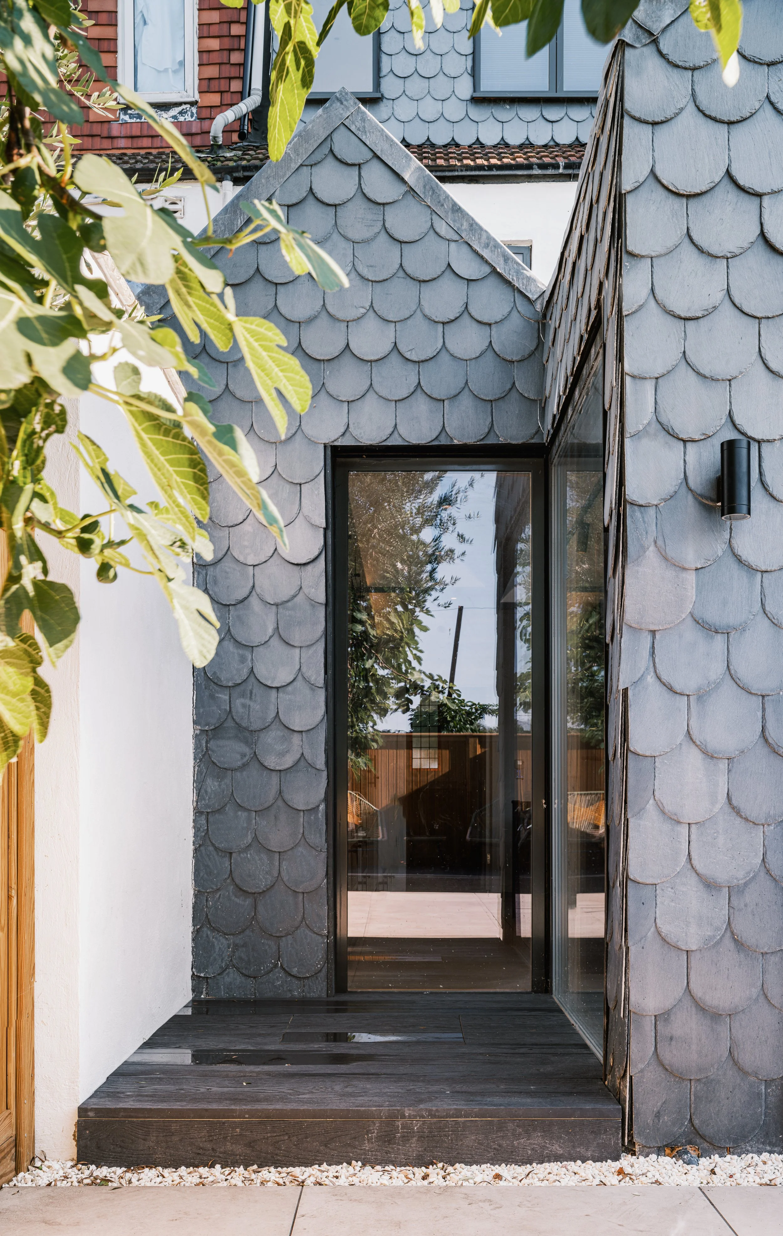 Three Pitched Roofs House