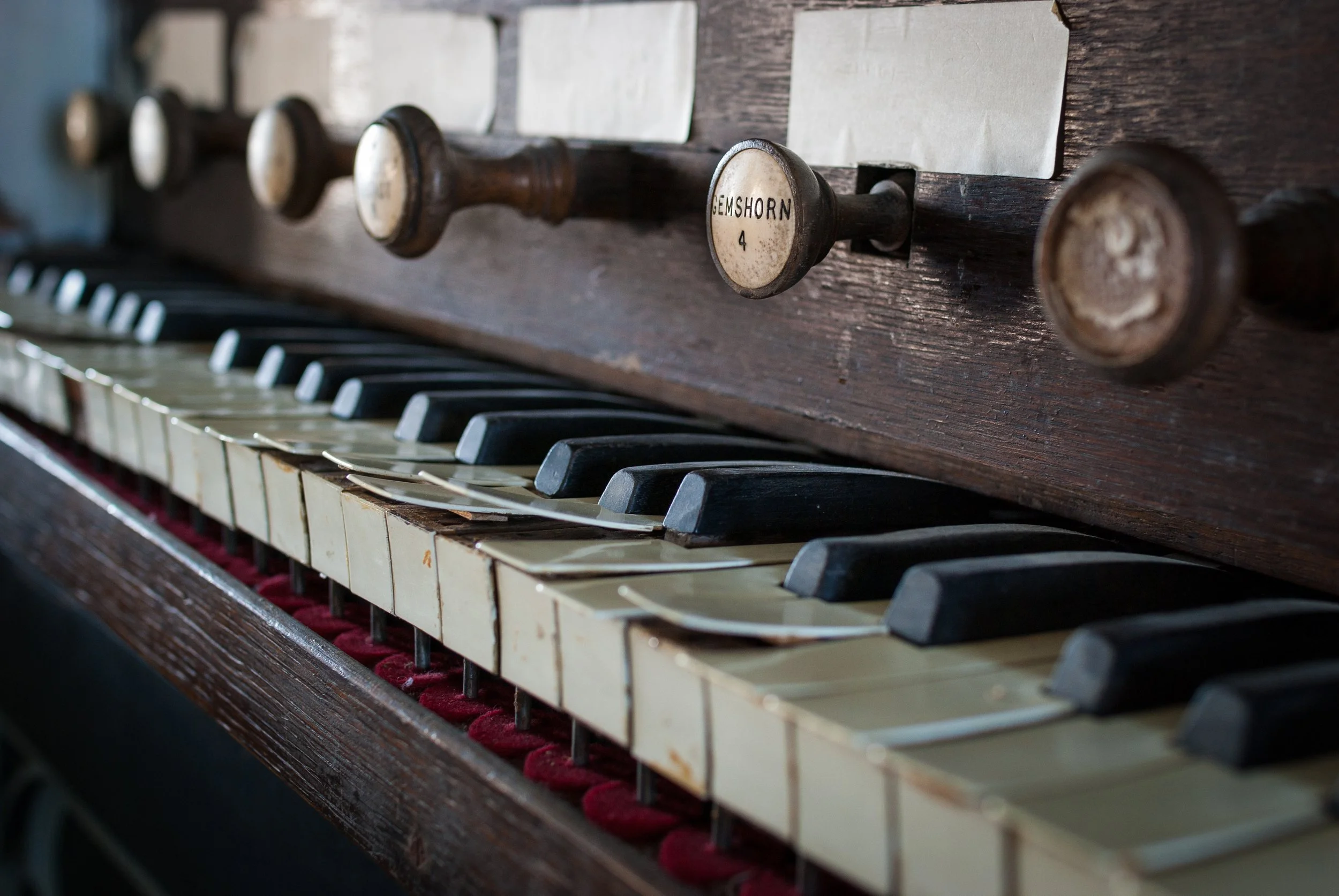 Close-up of the venerable old pipe organ, dating back centuries, inside the parish church in Badminton, South Gloucestershire