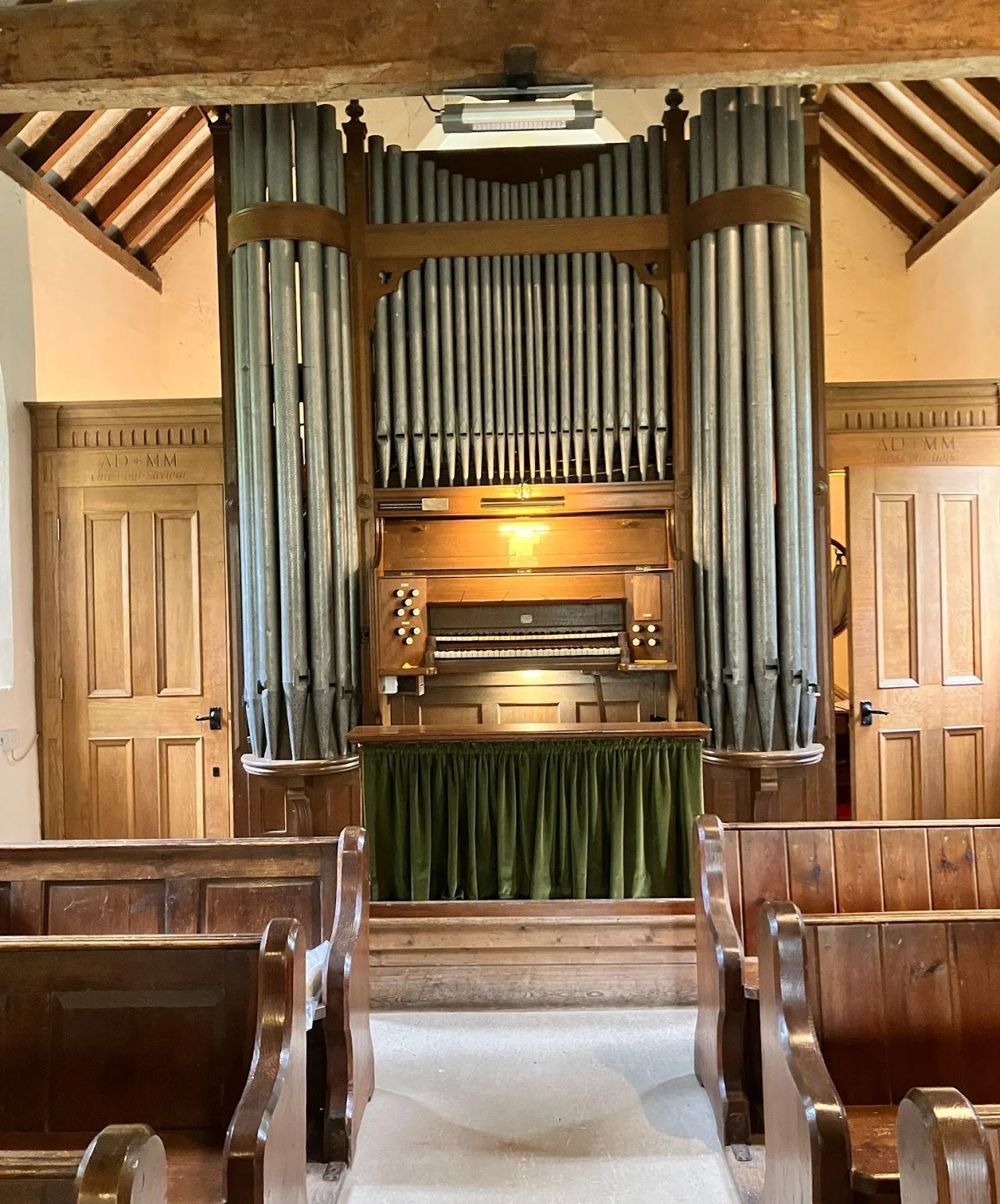 The pipe organ at a poignant funeral service at the beautiful St Andrew's Church in Eastleach, near Cirencester, Gloucestershire played by organist Ben Humphries