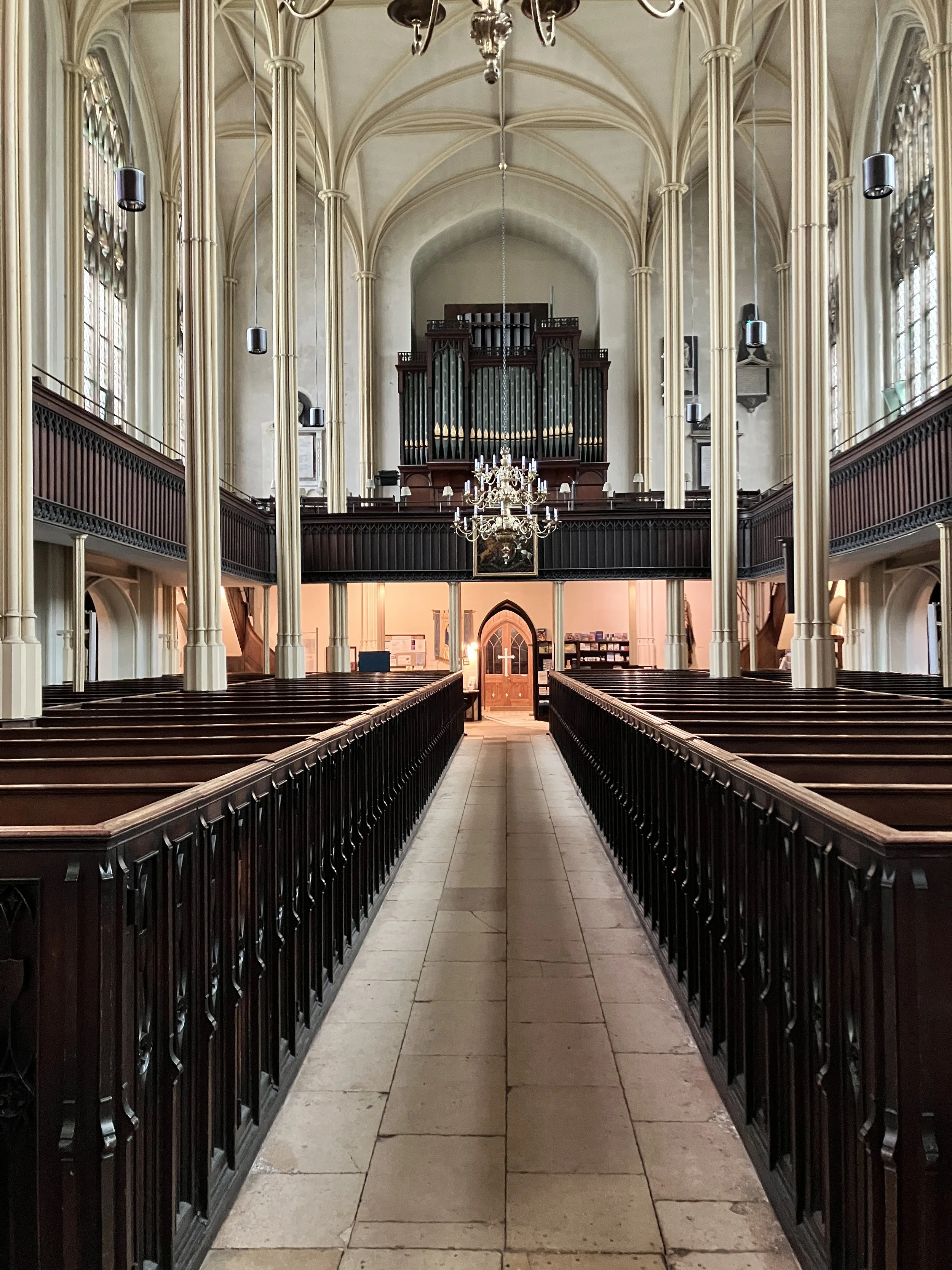 Another closer view of the organ pipework with organist ben humphries at the organ at St Mary's Church in Tetbury, Gloucestershire for this funeral service. 