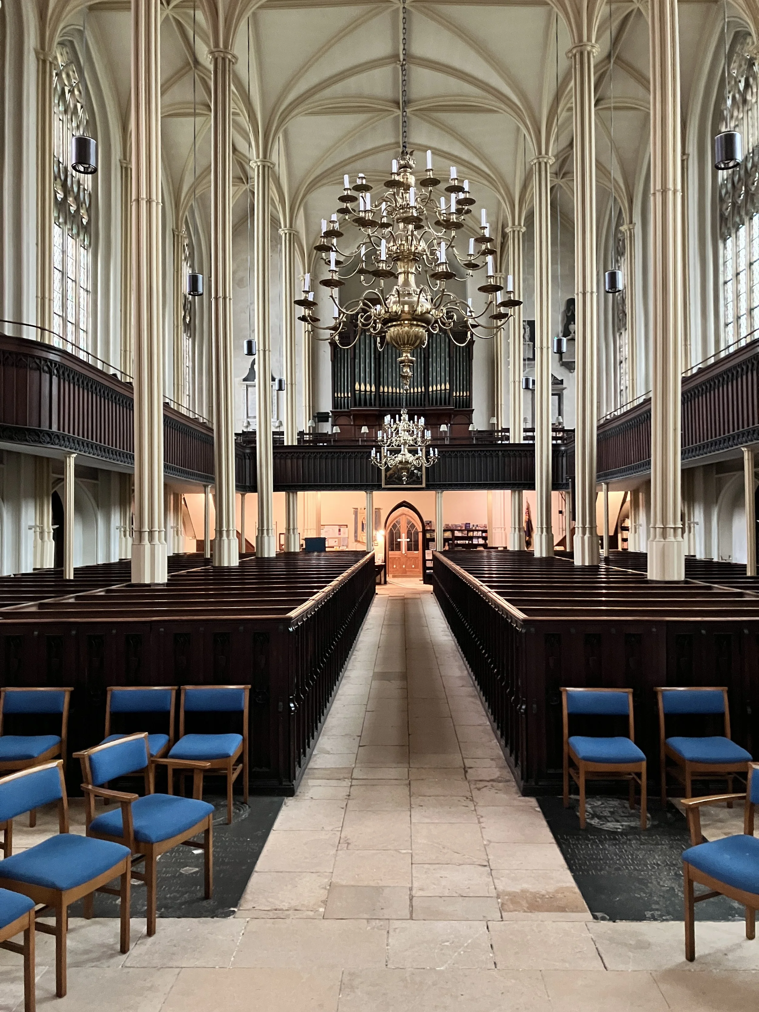 A view of the organ from the chancel in St Mary's Church in Tetbury, Gloucestershire with organist Ben Humphries at the console. 