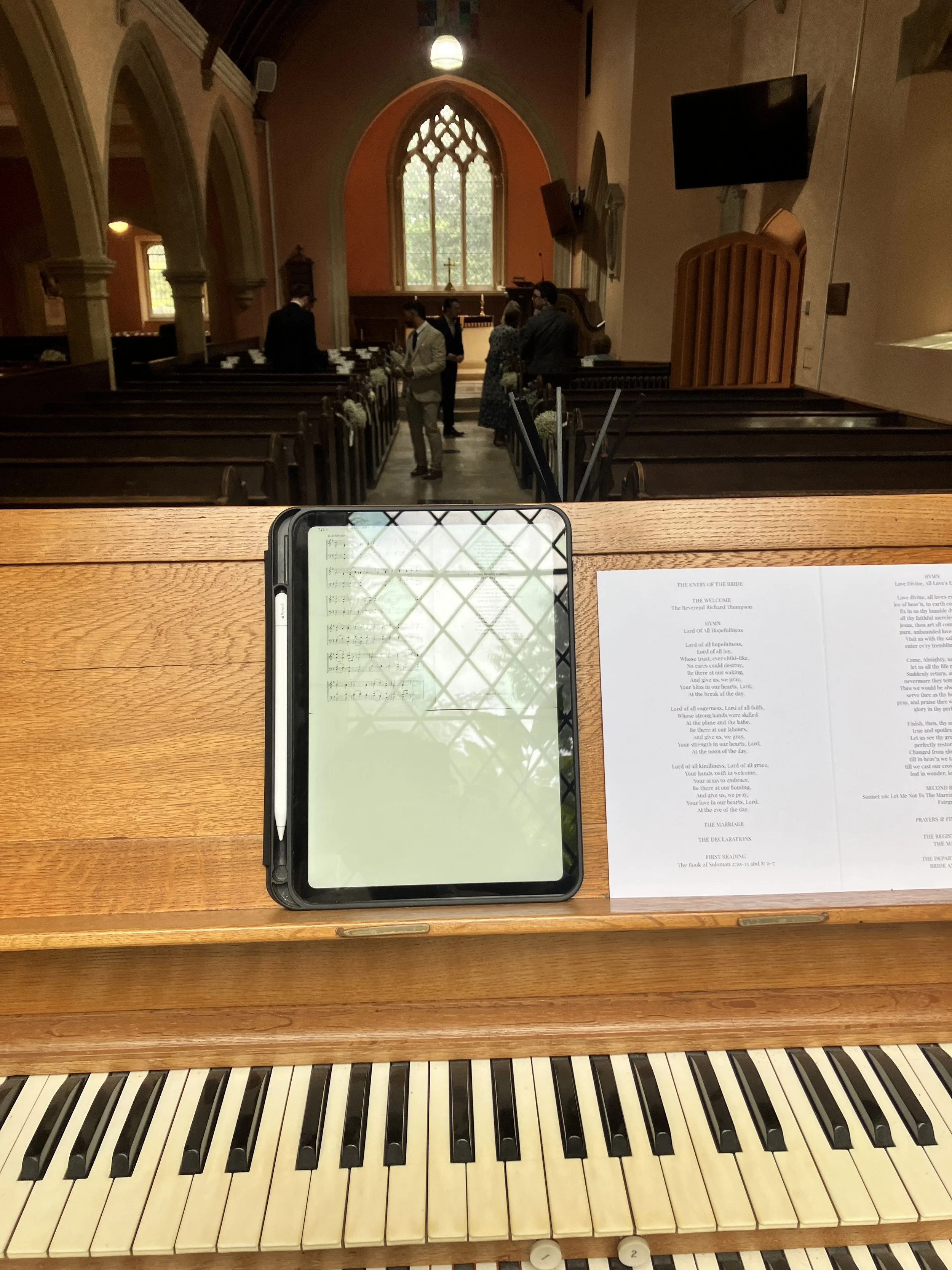 The organ at Westonbirt School Chapel in Gloucestershire being played by organist Ben Humphries