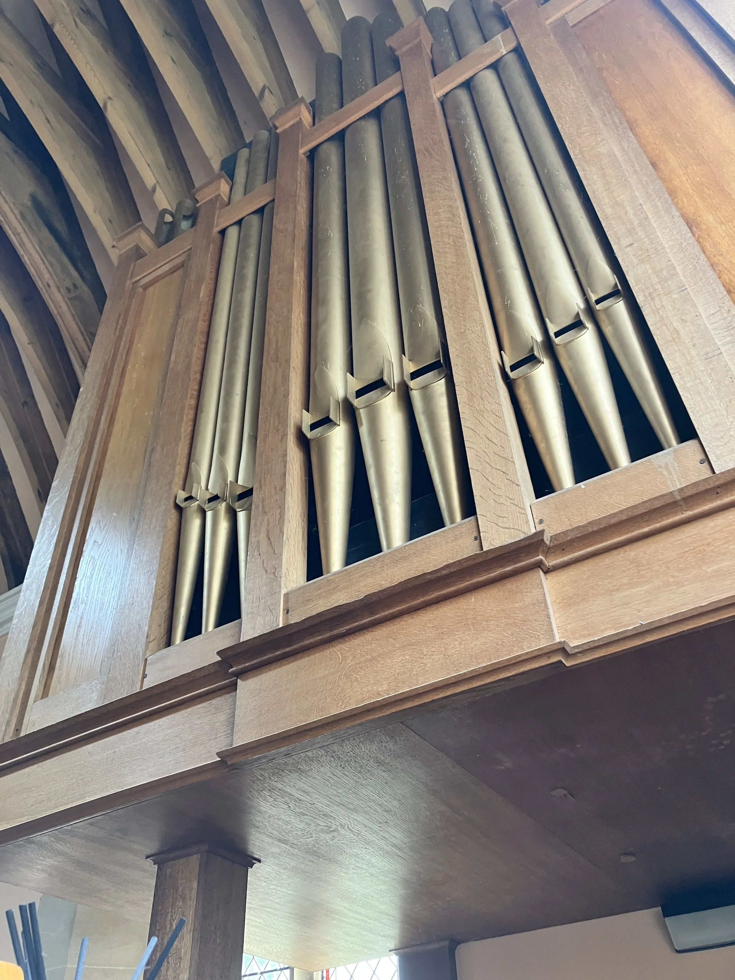 The pipework of the organ at Westonbirt School Chapel in Gloucestershire played by Ben Humphries for this wedding ceremony 
