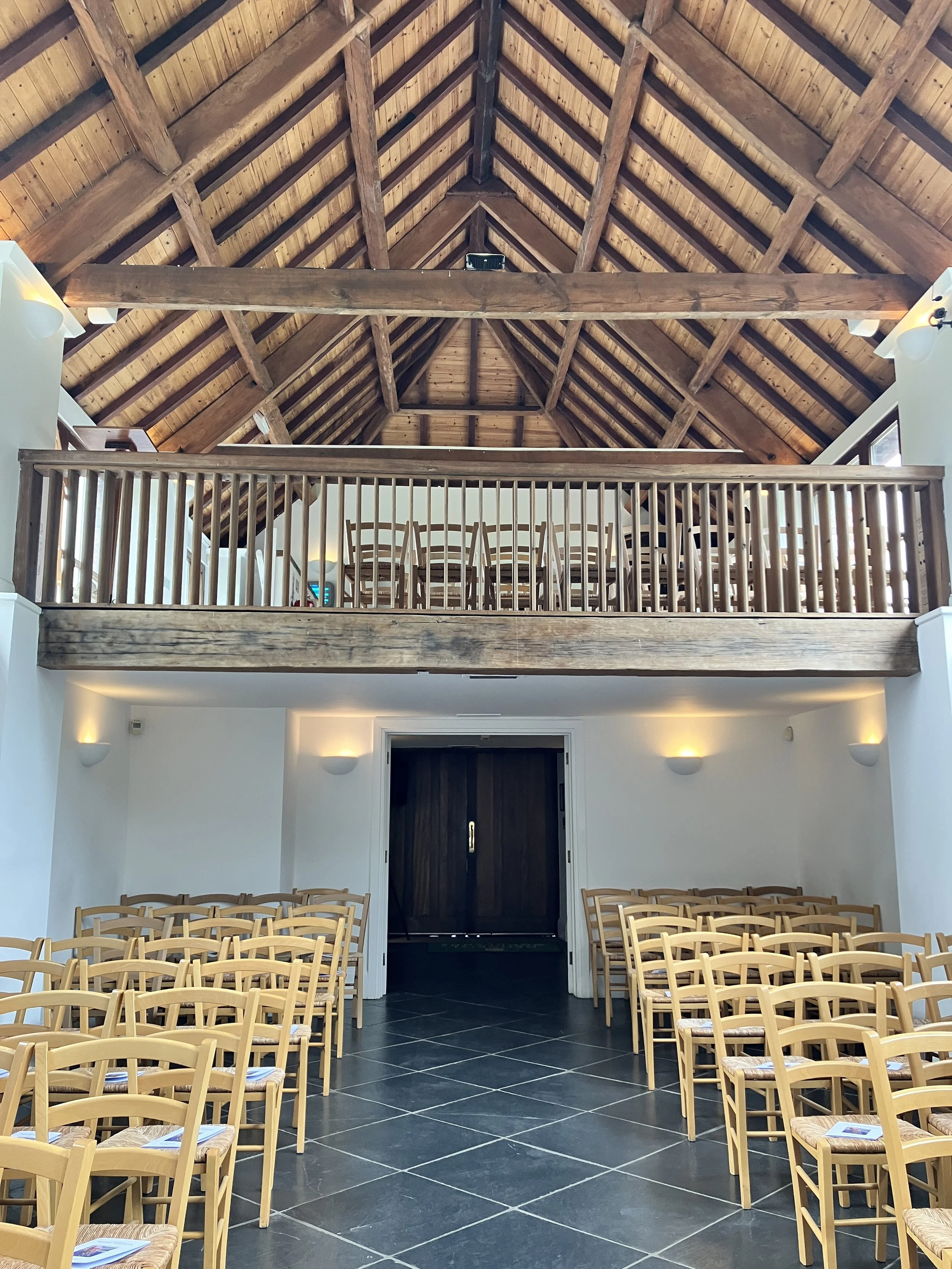 The interior of  Bristol Memorial Woodlands venue in South Gloucestershire with Ben Humphries the organist sat at the console ready to play for a funeral service