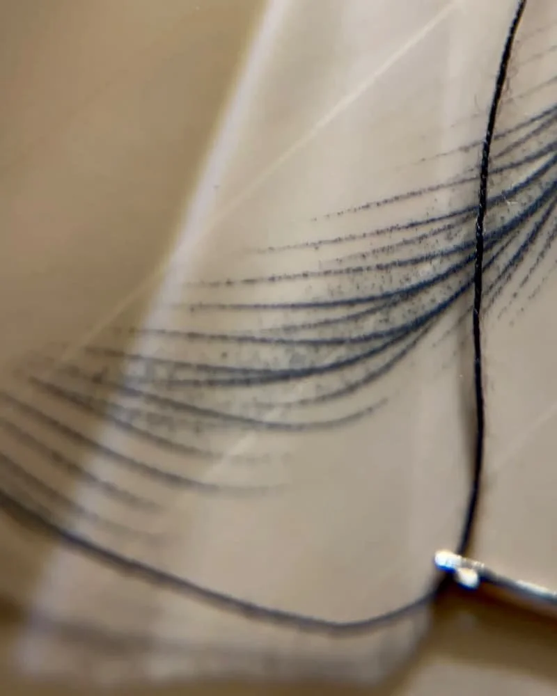 Fine hairstroke compared to a silk thread