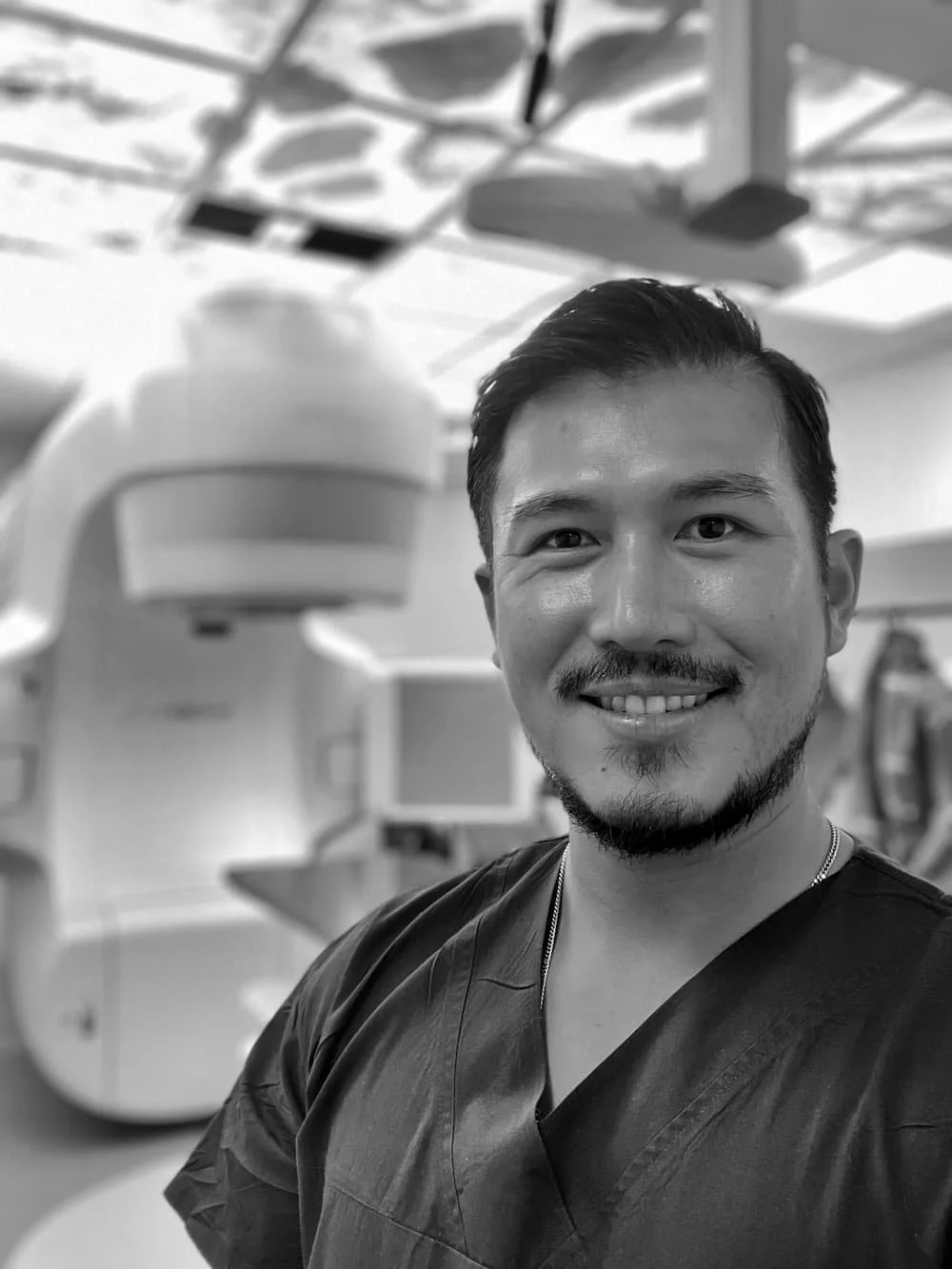 Athera Tay develops precision in his PMU work using his radiation science experience.